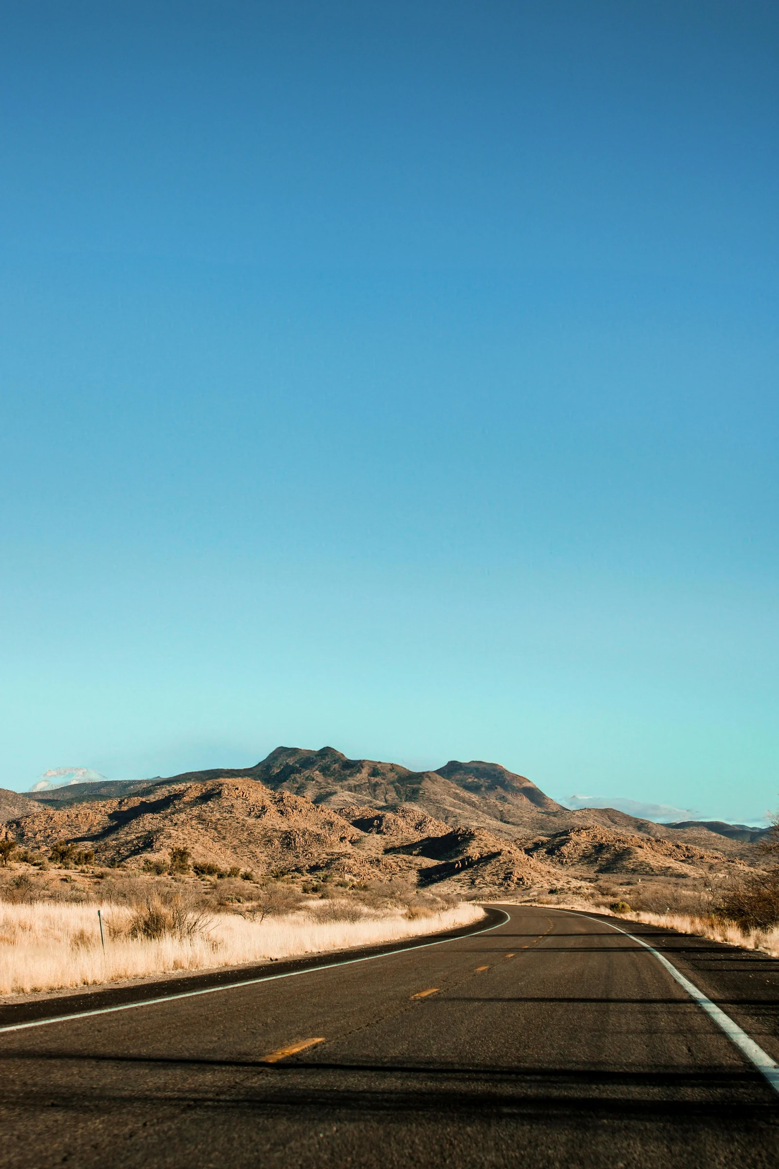 Arizona roadway through desert terrain